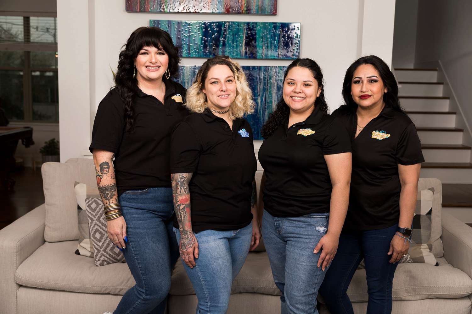 Home clean home - Naturalcare Cleaning Service staff pose for a group photo after cleaning a Houston home until it sparkles.